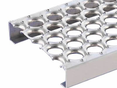 A plate section of an o-grip safety grating with its front being showed.