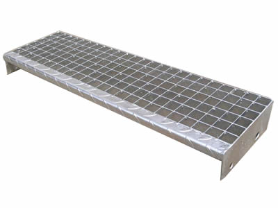 A press-locked tread steel grating on the ground.