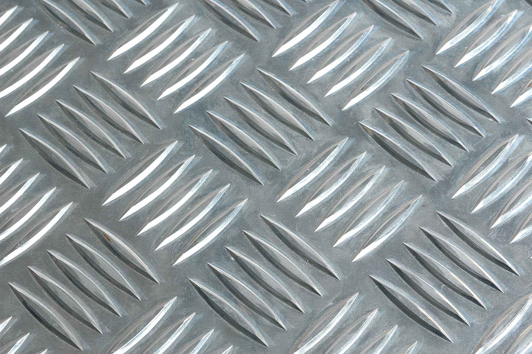 A piece of willow leaf pattern galvanized checker plate.